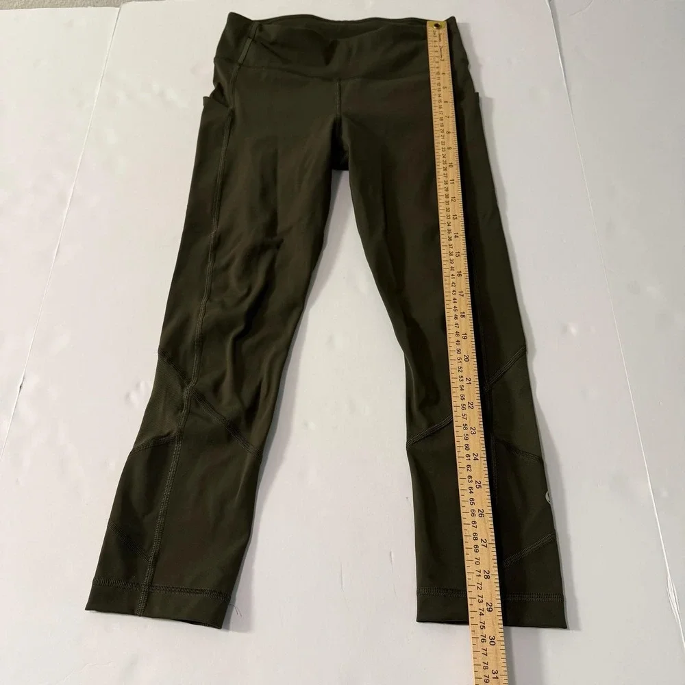 Lululemon Speed Up Crop 21 Dark Olive Green Running Leggings Pockets Womens 4